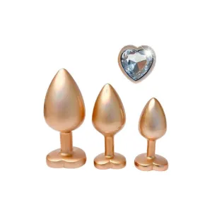 Set plug anal DREAMTOYS Pearl Gold Plug. 3 dopuri de dimensiuni progresive. 7.1 cm - 9.5 cm. cu baze în formă de inimă. auriu