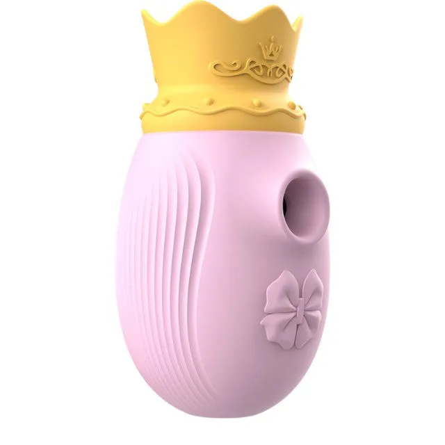 Stimulator clitoris INTENSE Clit Stimulator. design cu coroană. cu funcție de simulare sex oral. 10 funcții de aspirare. roz cu galben